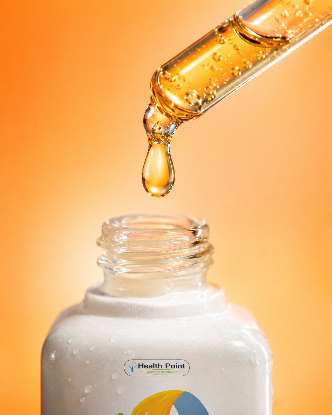Extreme close up of Health Point Vitamin C Serum dropper with a golden serum drop, showing skincare texture on a soft orange background